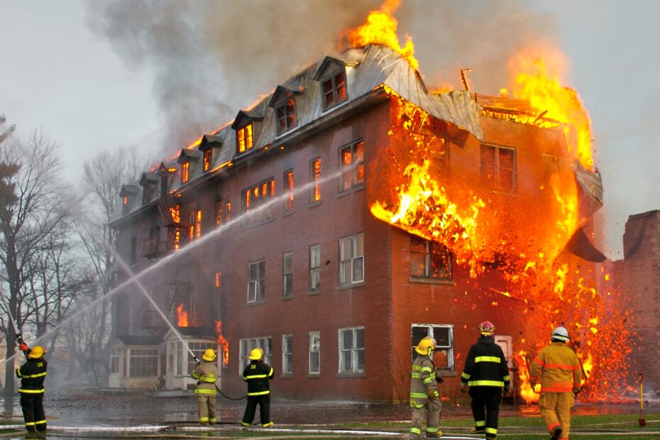 Firefighters putting out an uncontrolled blaze in a building